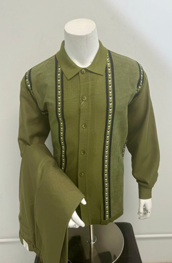 A mannequin is wearing a green shirt and pants