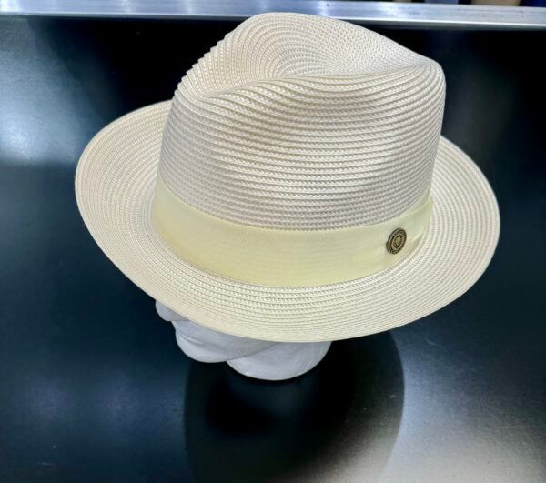 A white hat is on a mannequin head