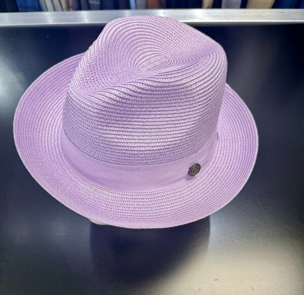 A purple hat is sitting on a black table