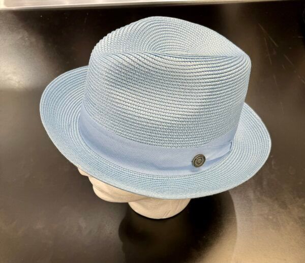A light blue hat is on a mannequin head