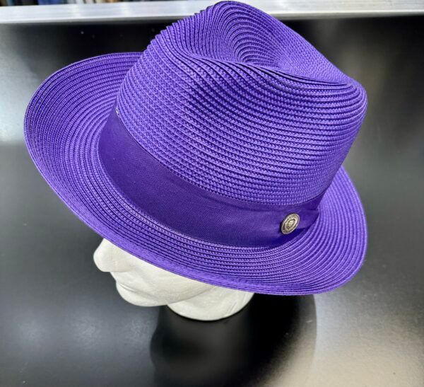 A purple hat is on a mannequin head