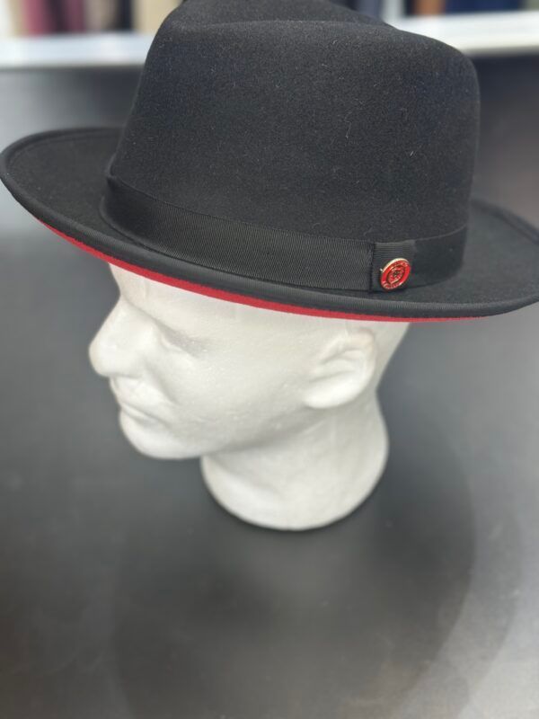 A black fedora hat is on a mannequin head.