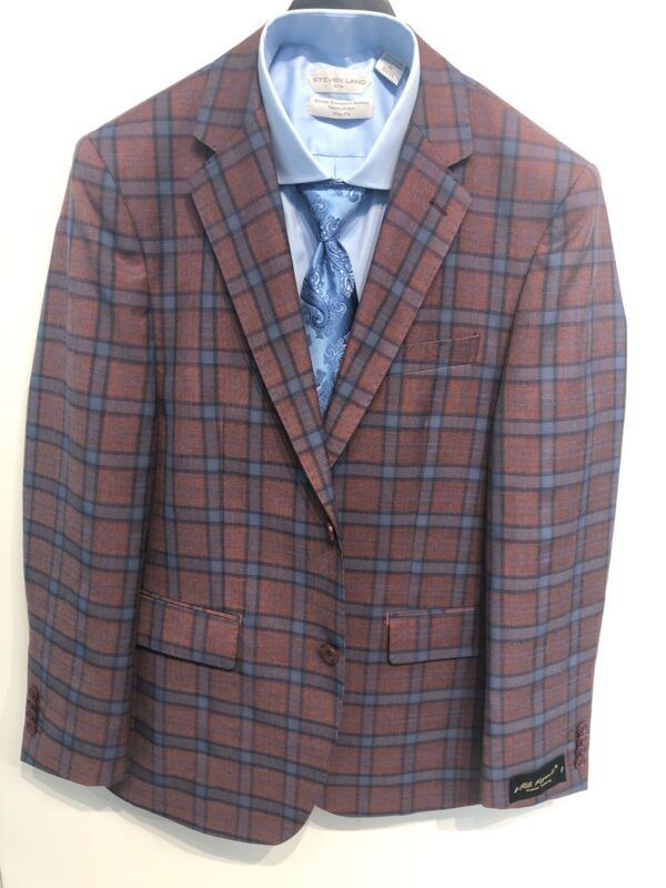 A plaid suit jacket with a blue shirt and tie