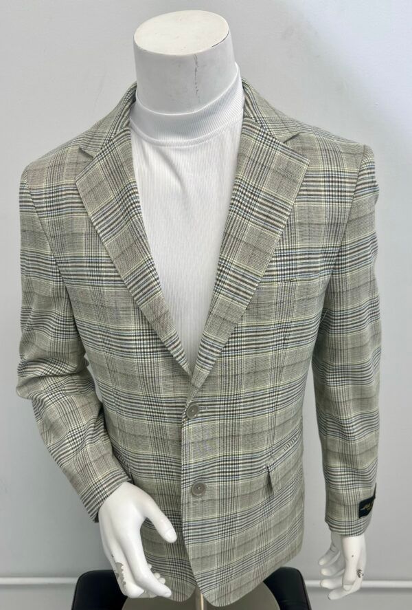 A mannequin is wearing a plaid jacket and a white turtleneck.