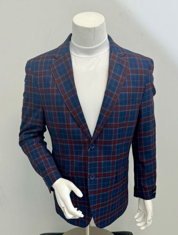 A blue and red plaid jacket is on a mannequin