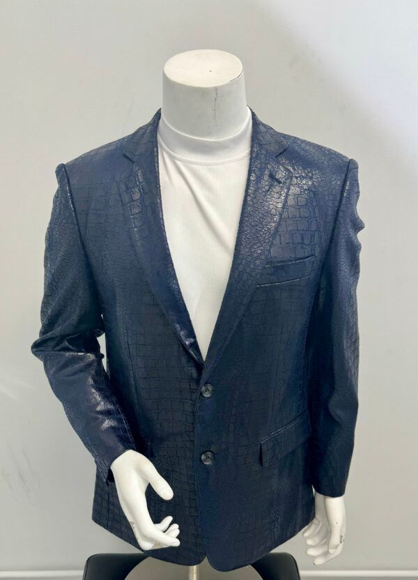 A mannequin wearing a blue jacket and a white shirt