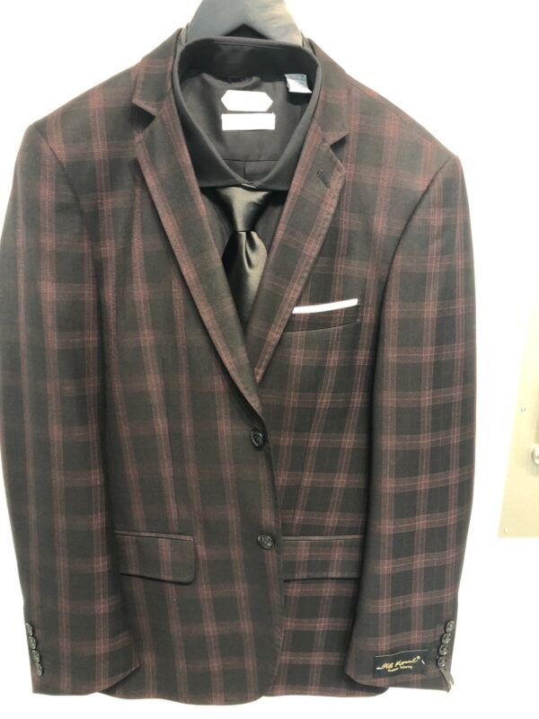 A plaid suit jacket and tie are hanging on a hanger