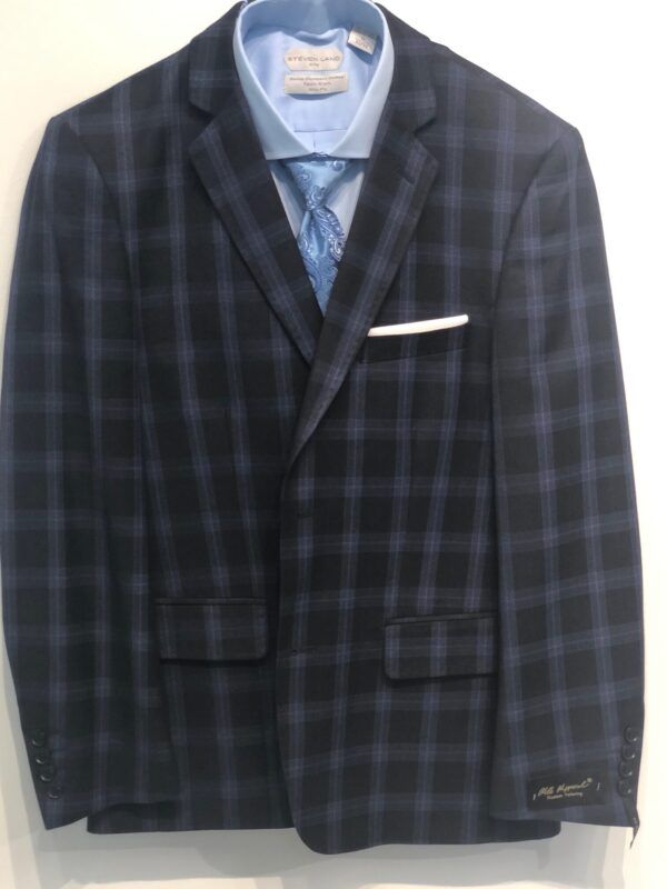 A blue plaid suit jacket with a blue shirt and tie