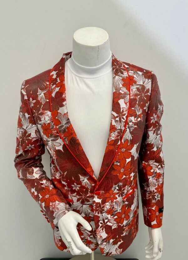 A mannequin is wearing a red floral jacket