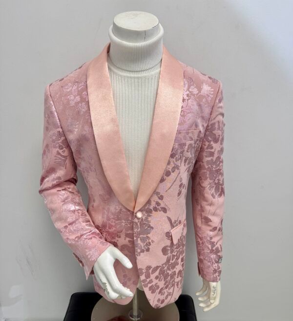 A mannequin is wearing a pink jacket with flowers on it