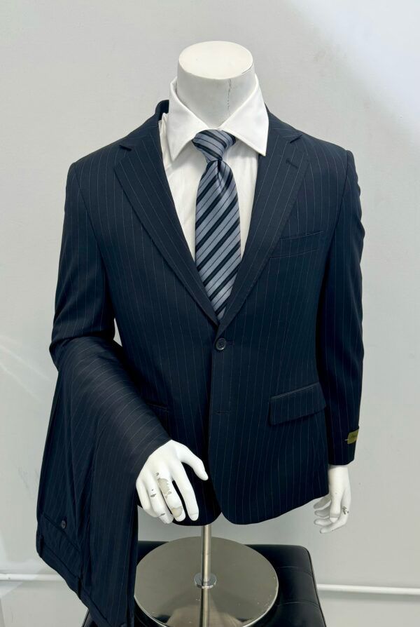 A mannequin is wearing a suit and tie