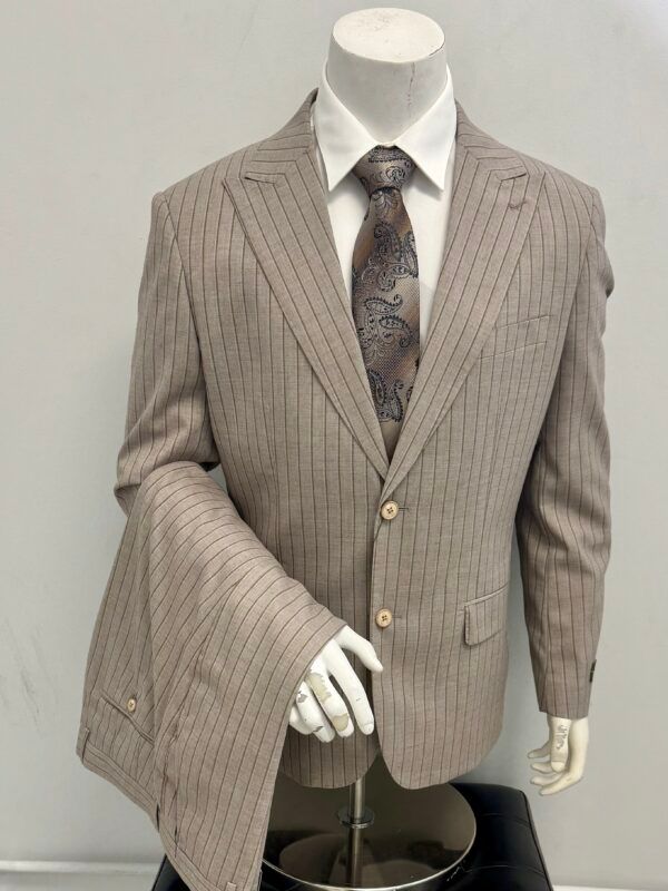 A mannequin is wearing a suit and tie