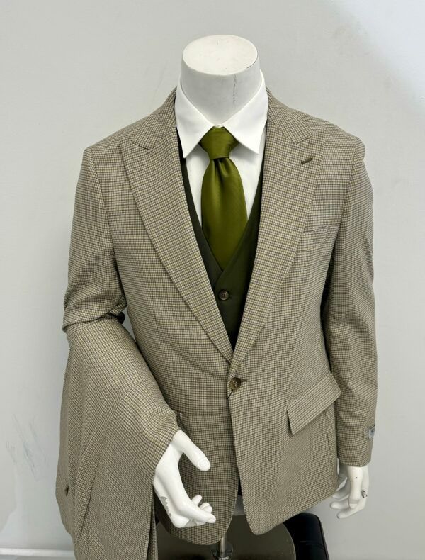 A mannequin is wearing a suit and tie