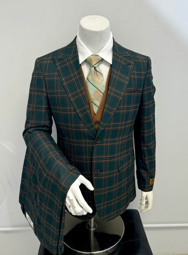 A man is wearing a green plaid suit and tie on a mannequin.