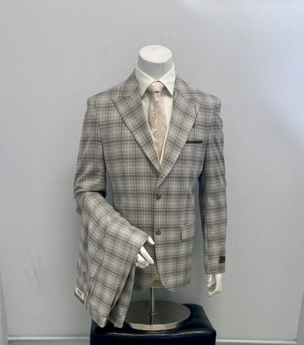 A mannequin is wearing a plaid suit and tie