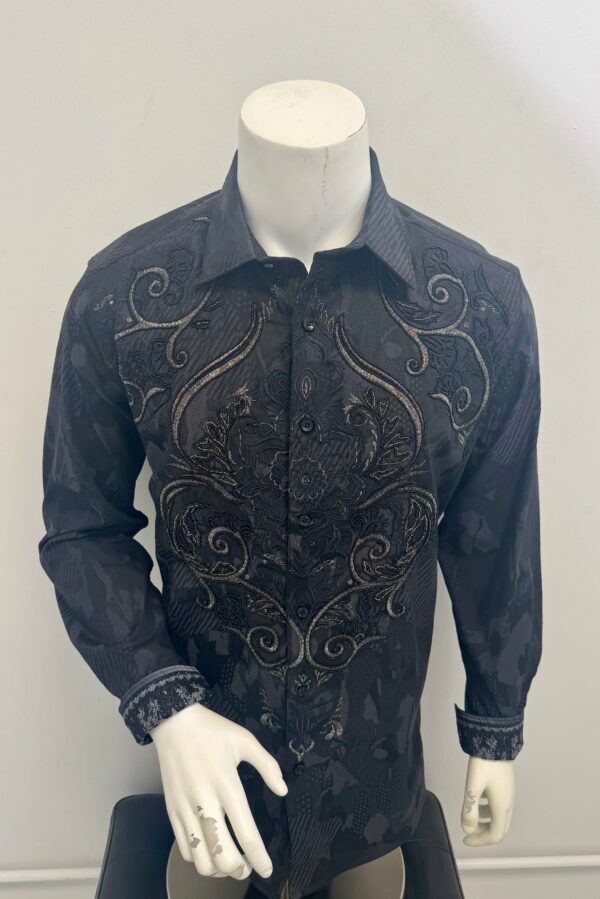 A man is wearing a black shirt on a mannequin.