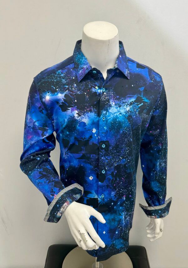 A mannequin is wearing a blue shirt with a galaxy print