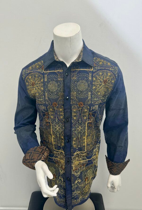 A mannequin is wearing a blue shirt with a pattern on it.
