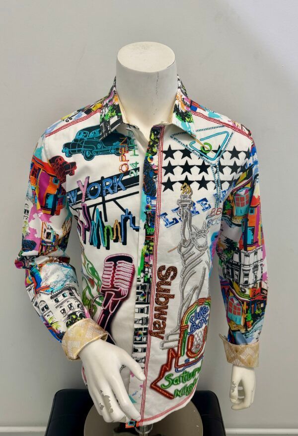A mannequin is wearing a colorful shirt with graffiti on it.