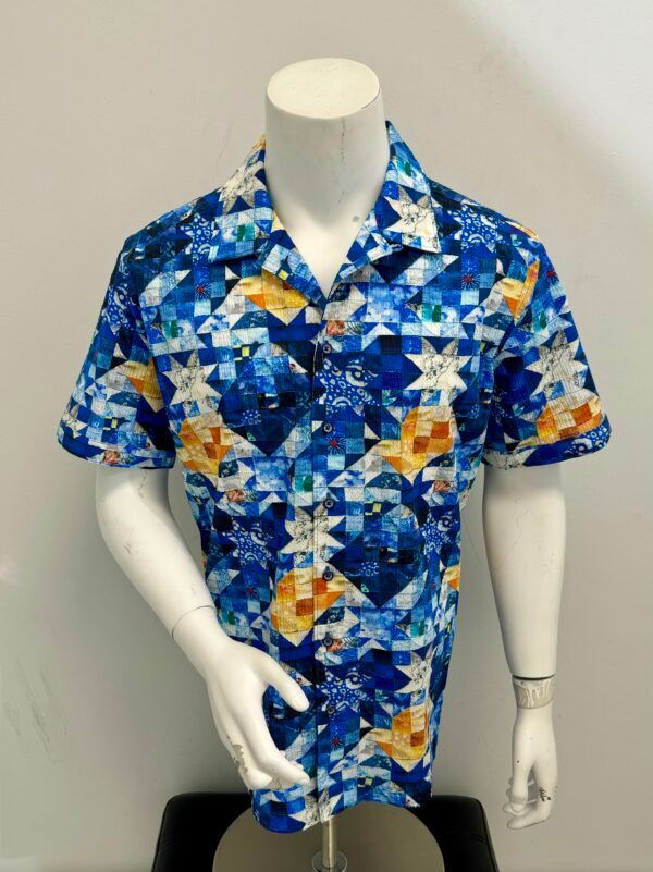 A blue hawaiian shirt is on a mannequin