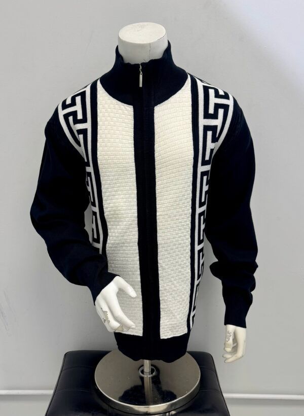 A black and white jacket is on a mannequin