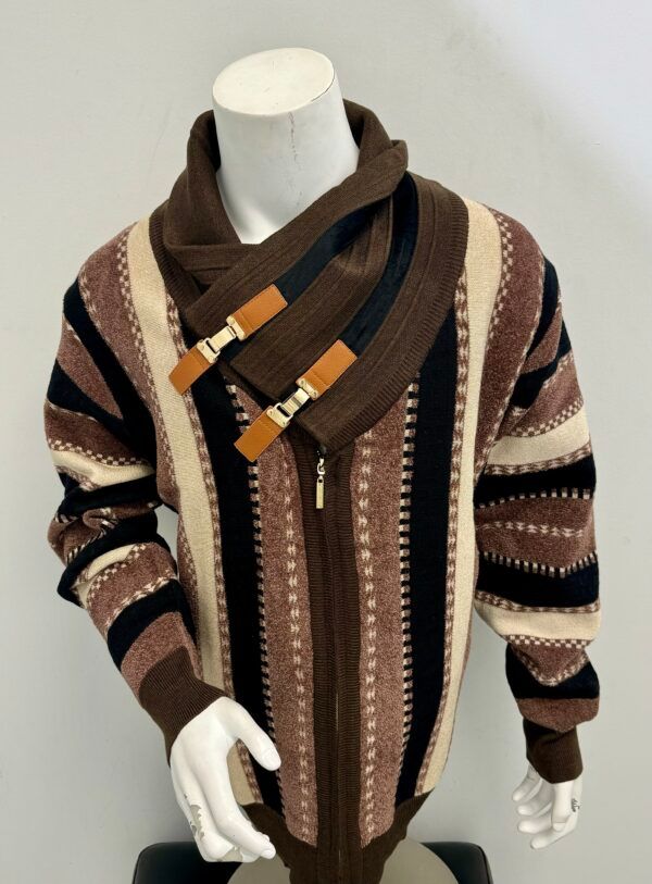 A mannequin is wearing a sweater with a scarf around his neck