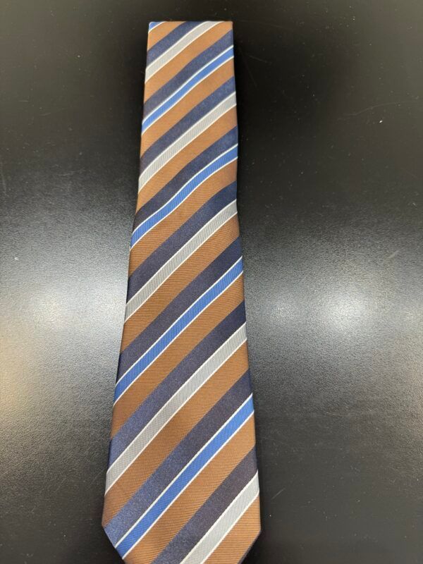 A brown and blue striped tie is on a black surface