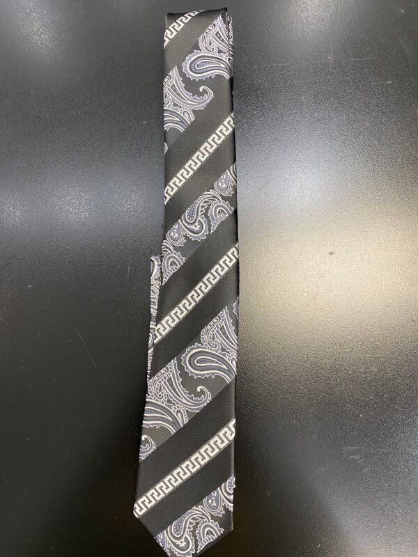 A black tie with a white paisley pattern on it