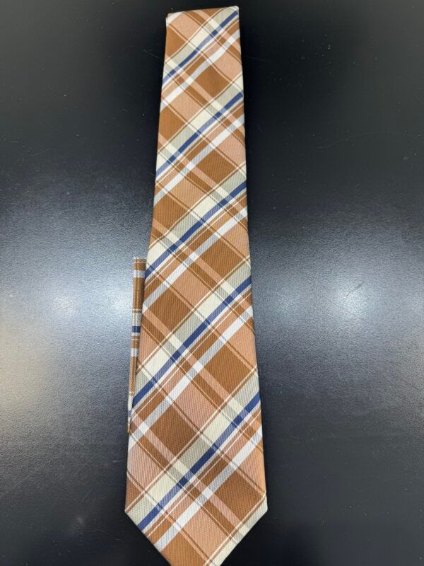 A brown and white plaid tie is on a black surface