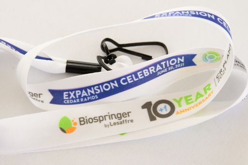 A lanyard that says ' expansion celebration ' on it