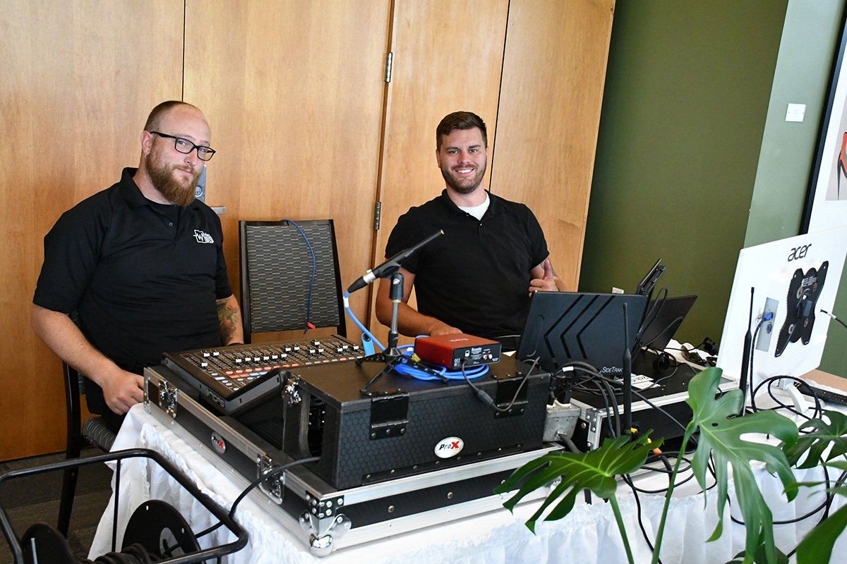 2 man hosting a corporate event