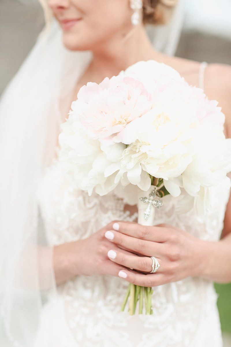 A bride holding her bridal bouquet