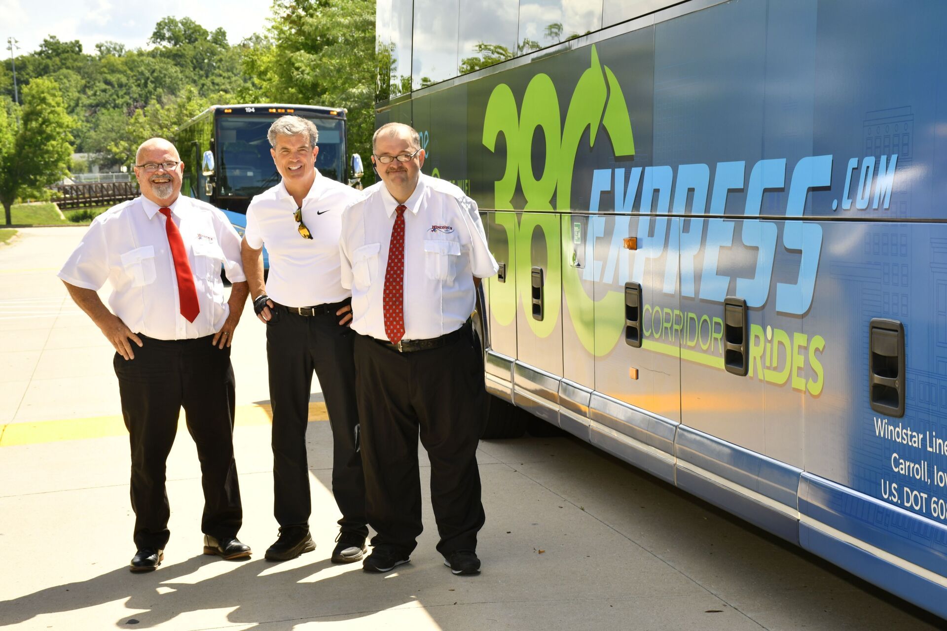 staff beside the bus