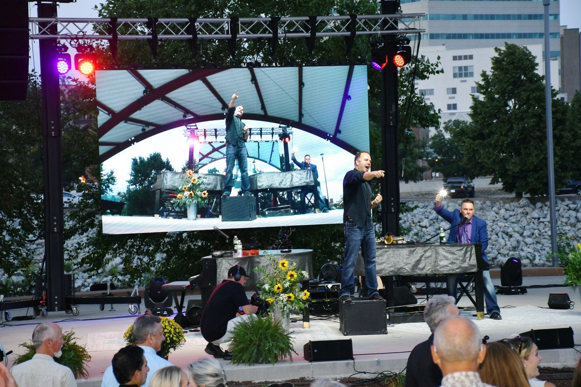 men entertaining people