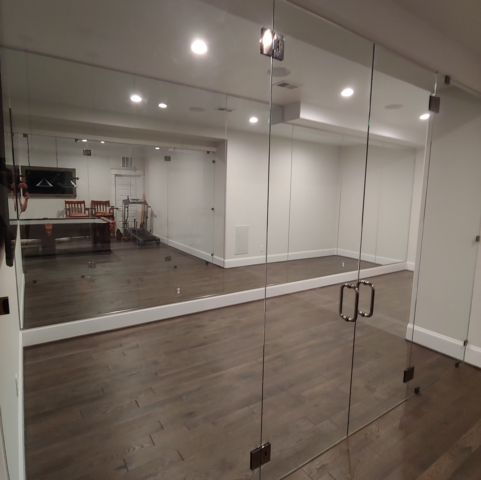 There is a large mirror in the middle of the room.