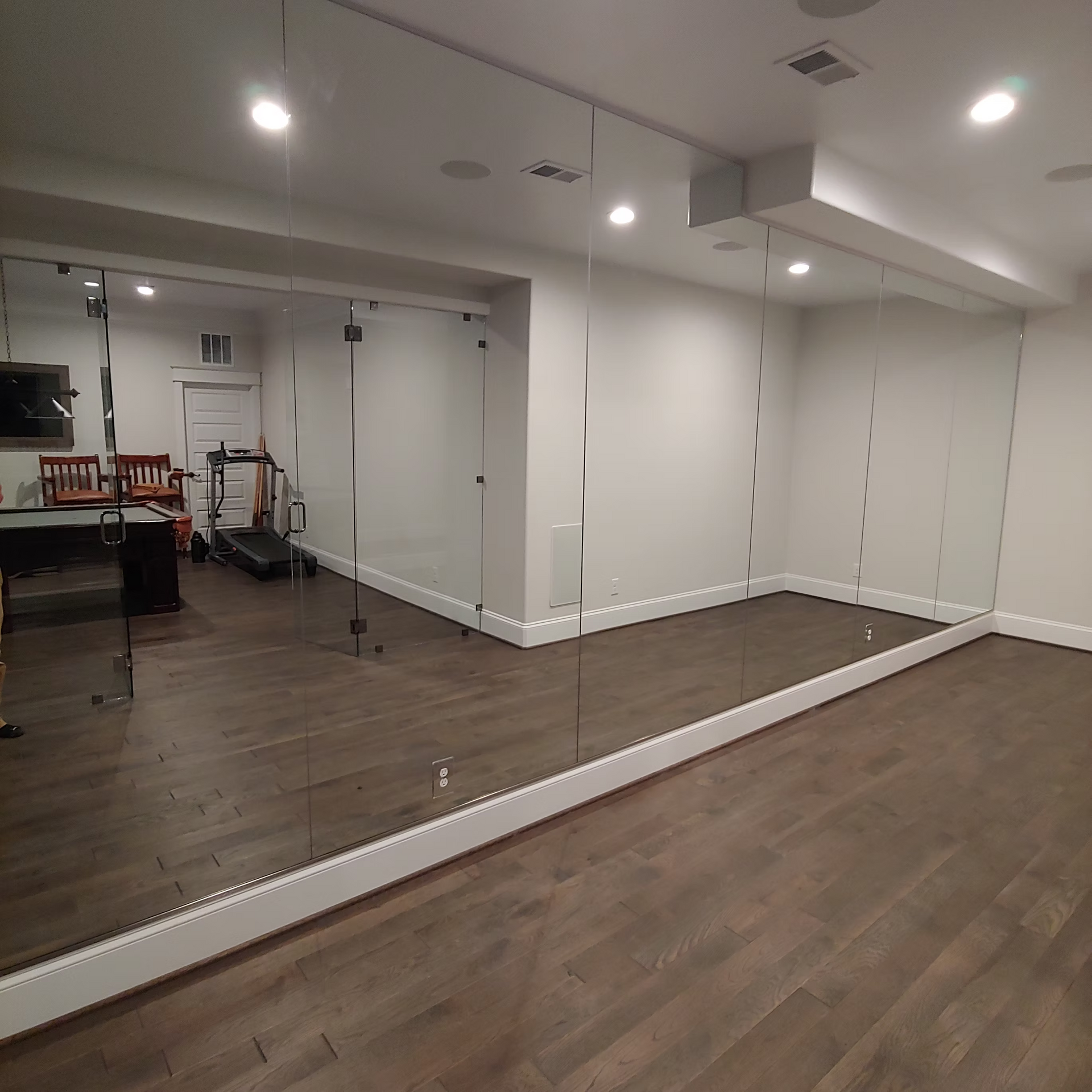 There is a large mirror in the middle of the room.