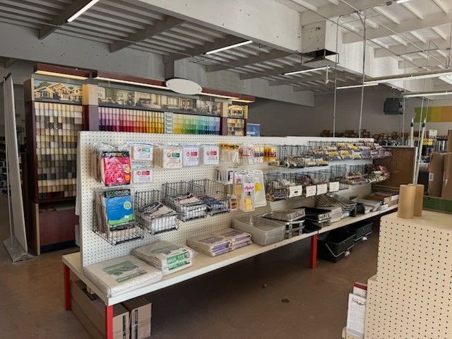A store filled with lots of shelves and boxes.