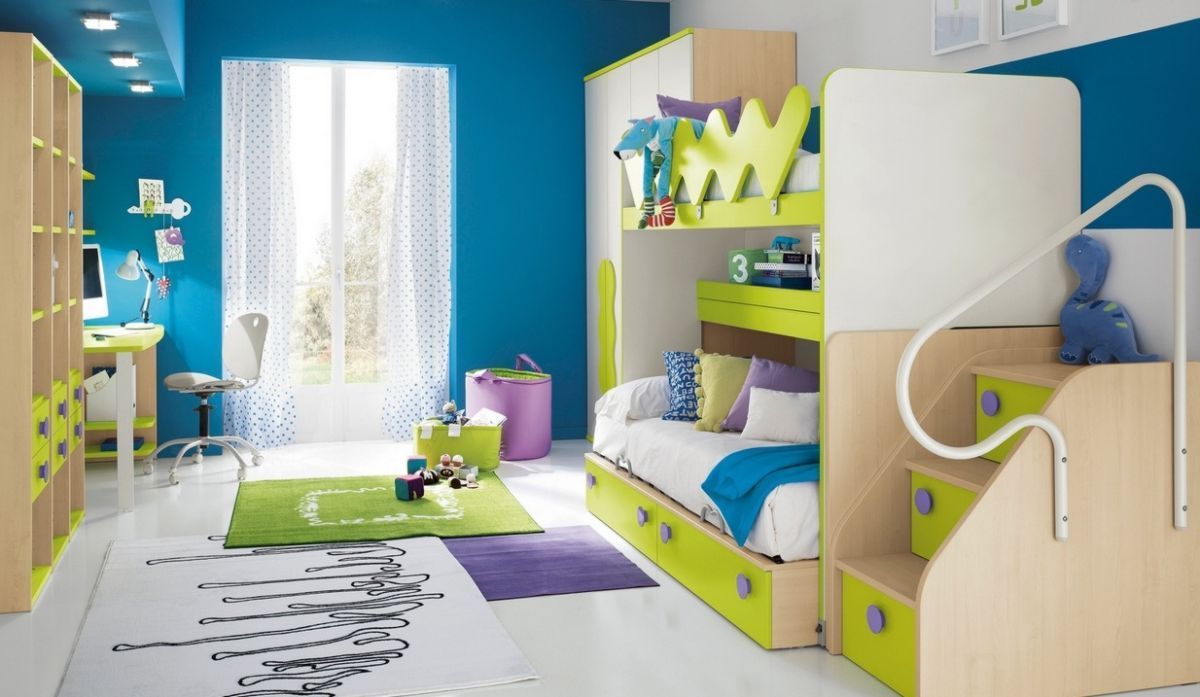 A child 's bedroom with a bunk bed and stairs