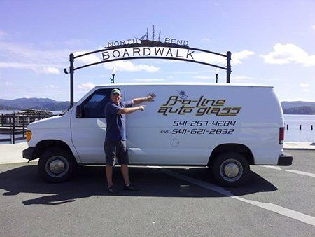 man standing with white  van