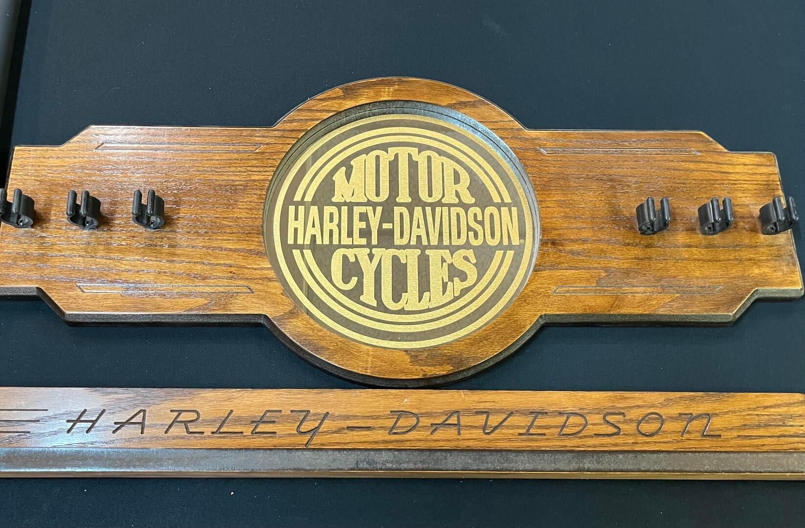 A close up of a billiard equipment label on a wooden table.