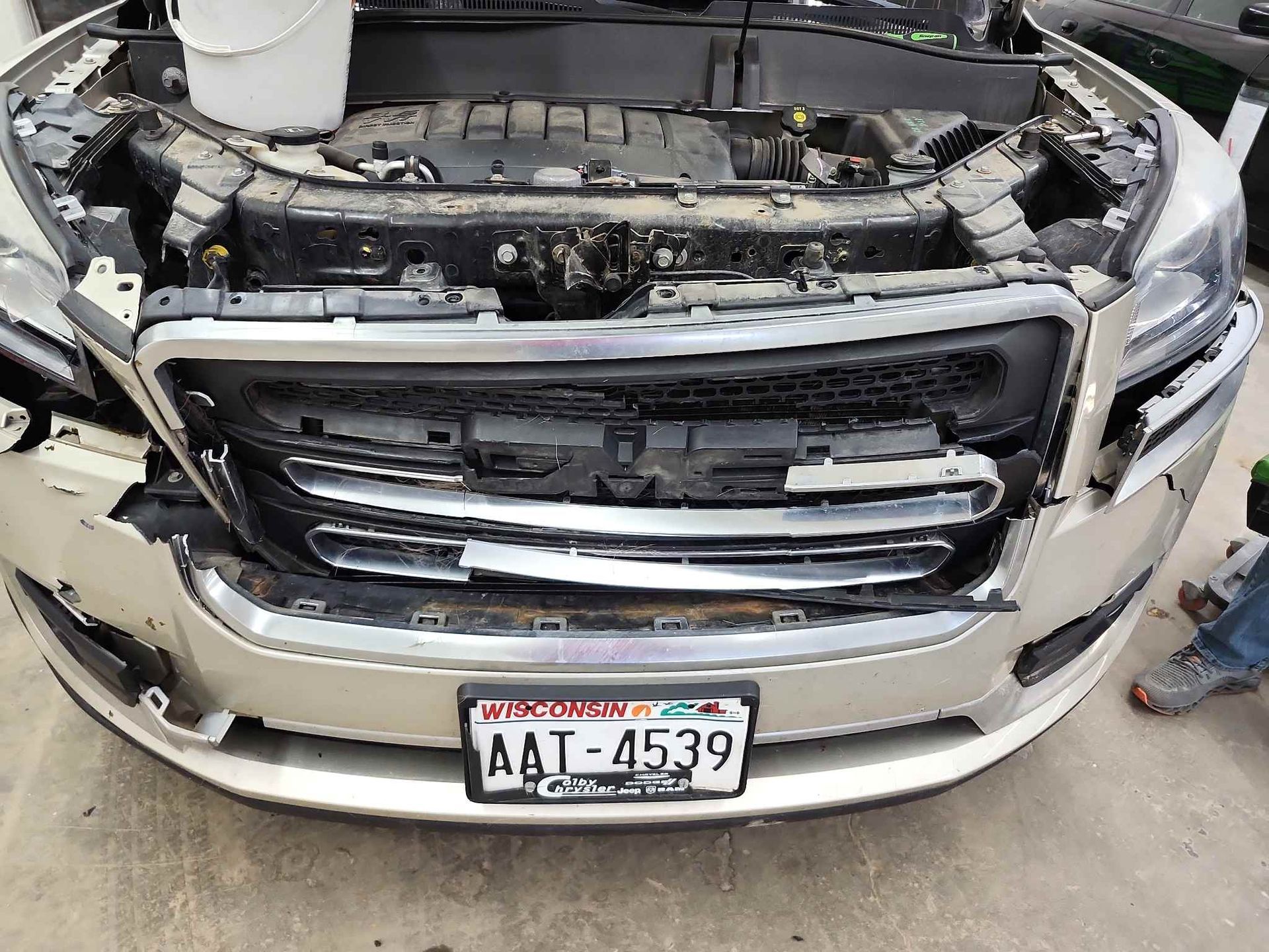 A car with the hood open.