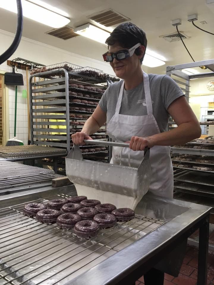 Woman making donuts