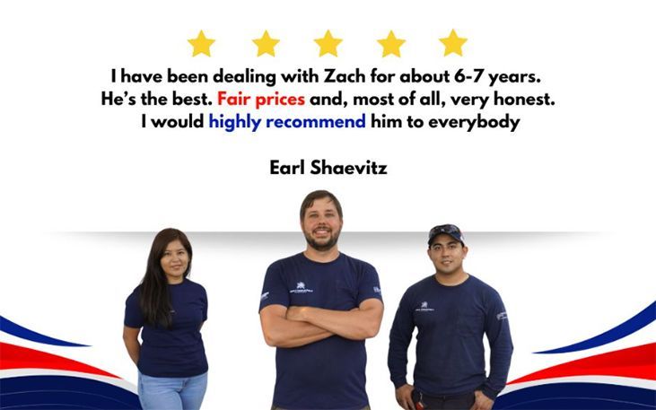 Three people standing next to each other with a review from earl shaevitz