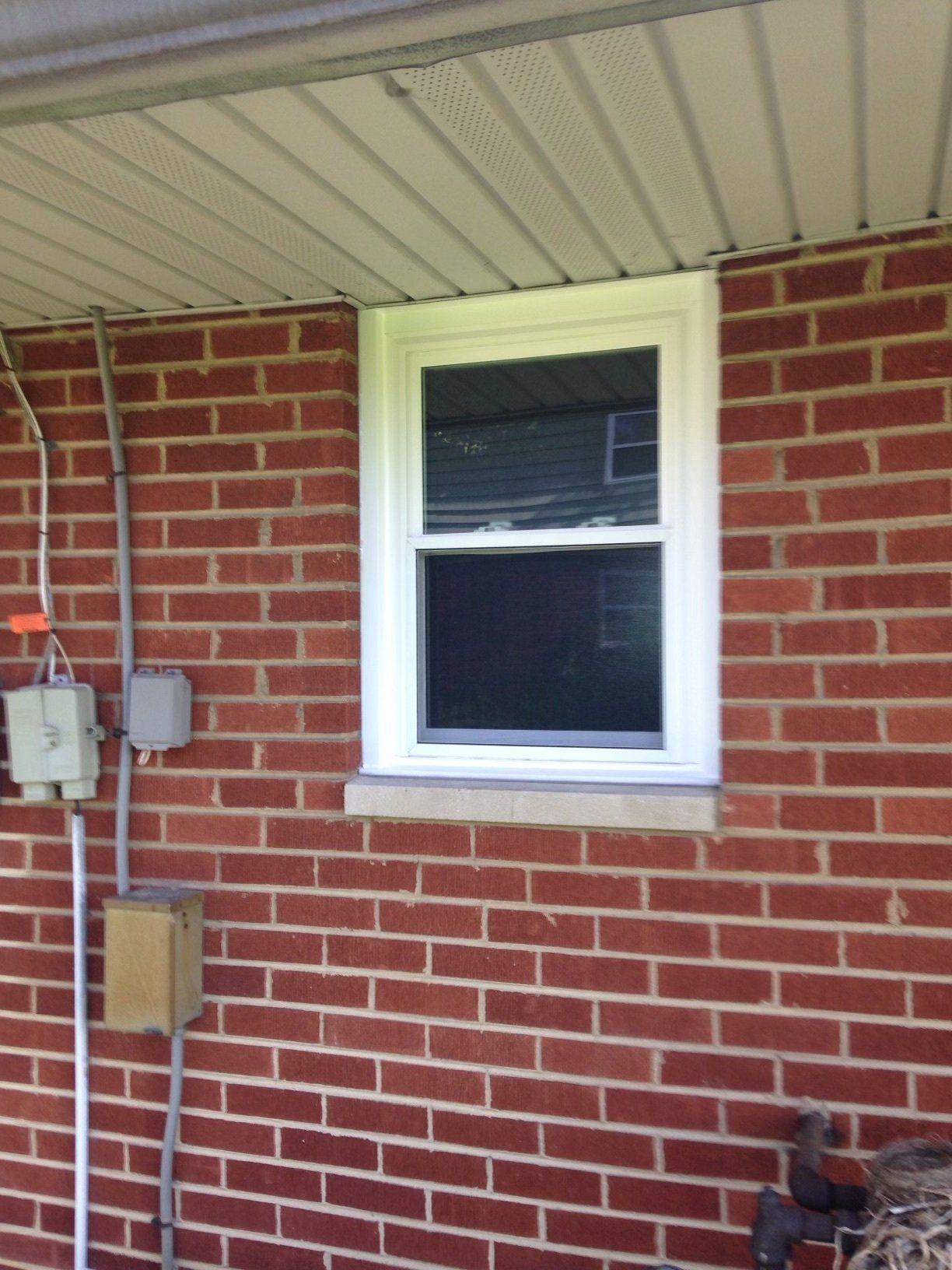Glass window and brick wall