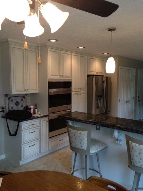 kitchen with bar chairs
