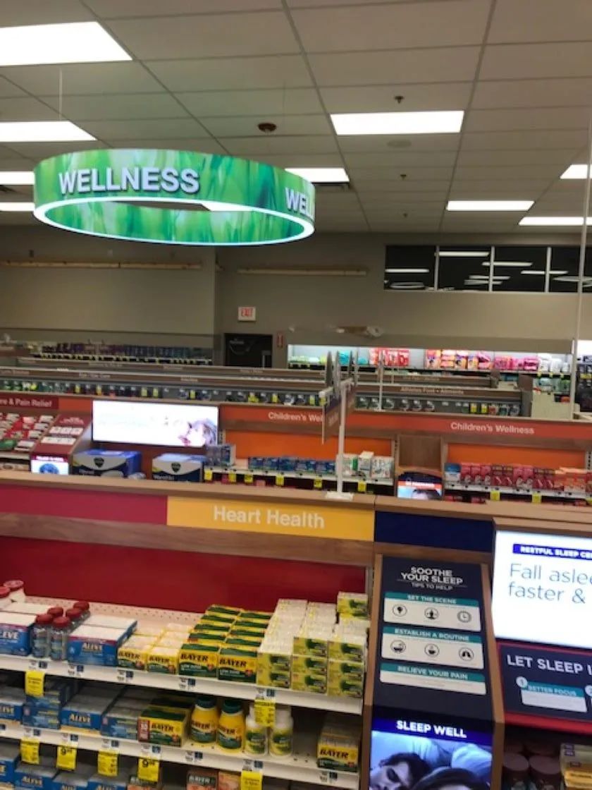 Inside a pharmacy, the 