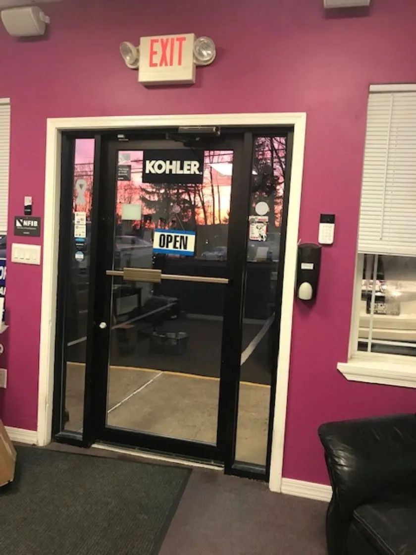Entrance with glass doors, KOHLER sign, 