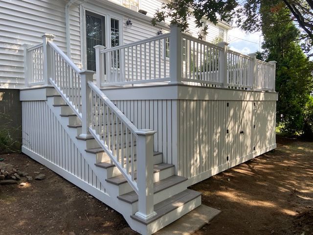 White deck with staircase 