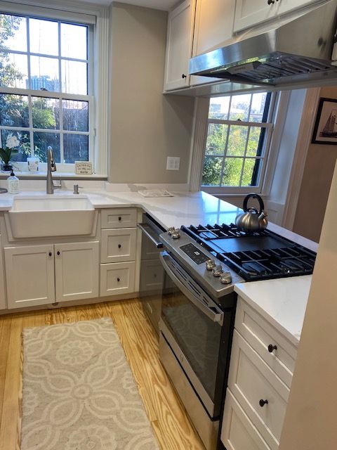 White cabinets and farmer sink