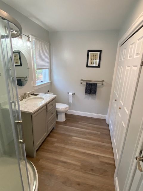 Bathroom with curved shower